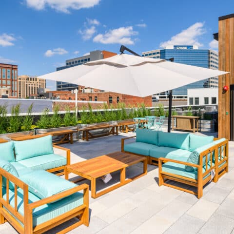 View of gorgeous rooftop deck with seating area at The Cooper